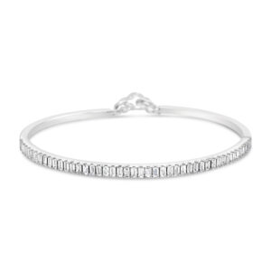 Pulsera de oro blanco 18k con 46 diamantes corte baguette y 1 rubí en el cierre