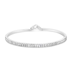 Pulsera de oro blanco 18k con 46 diamantes corte baguette y 1 rubí en el cierre